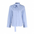 VacationGrabs light blue long-sleeve linen-blend blouse with a turn-down collar and lace-up waist tie detail.
