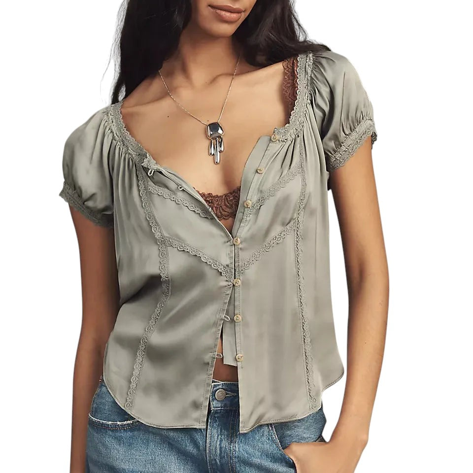 VacationGrabs sage green cropped button-up top with delicate lace trim and short sleeves worn with blue jeans