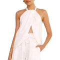 VacationGrabs white halter neck blouse with an open cutout front, asymmetric hem, and backless design.
