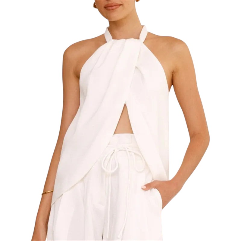 VacationGrabs white halter neck blouse with an open cutout front, asymmetric hem, and backless design.