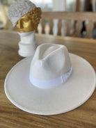 Stylish vegan felt panama hat in white with a sleek ribbon for eco-conscious fashion lovers