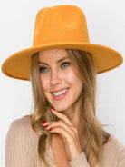 Stylish yellow vegan panama hat for women, perfect for sun protection and fashion-forward looks