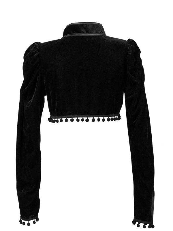 Black cropped top with puffed sleeves and pom-pom trim, showcasing velvet steampunk fashion style