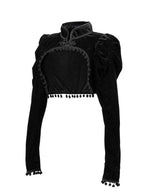 Black cropped top from VacationGrabs showcasing velvet steampunk fashion with puffed sleeves and decorative trim