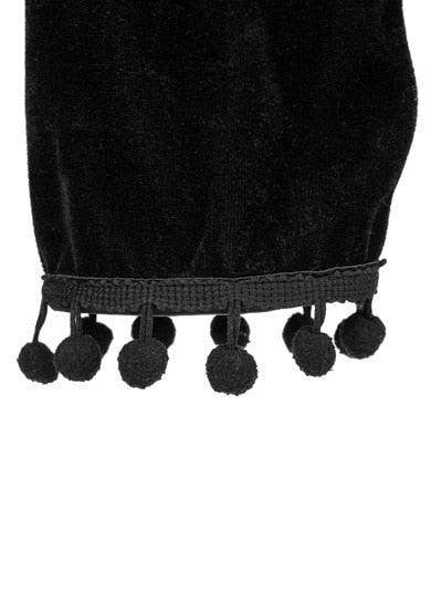 Black cropped top with pom pom detail in velvet steampunk fashion for a stylish look