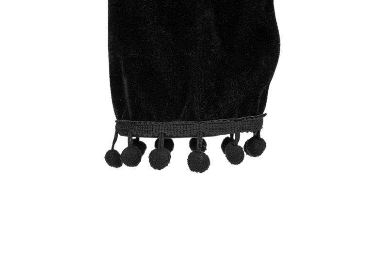 Black cropped top with pom pom detail in velvet steampunk fashion for a stylish look