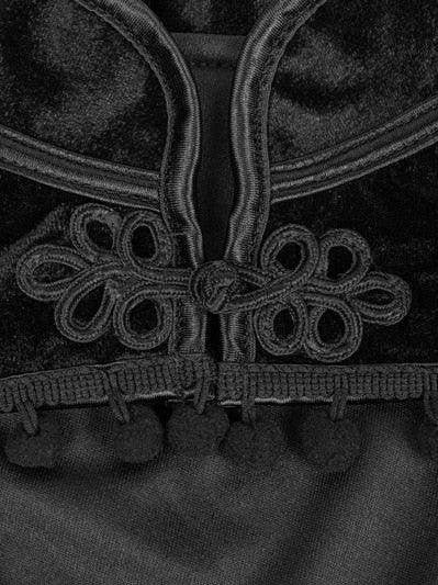 Close-up of black velvet steampunk fashion cropped top detailing with intricate design elements