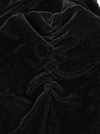 Close-up of black velvet steampunk fashion cropped top showcasing soft fabric and intricate detailing