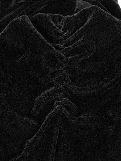 Close-up of black velvet steampunk fashion cropped top showcasing soft fabric and intricate detailing