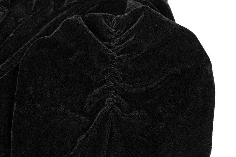 Close-up of black velvet steampunk fashion cropped top showcasing soft fabric and intricate detailing