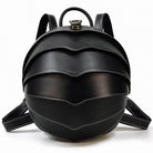 Stylish black accordion beetle daypack with unique curved design and adjustable straps for everyday use