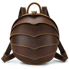 Accordion beetle daypack in brown leather with stylish layered design and adjustable straps