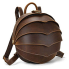 Accordion beetle daypack in brown leather with unique layered design and adjustable straps