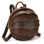 Accordion beetle daypack in brown leather with unique layered design and adjustable straps