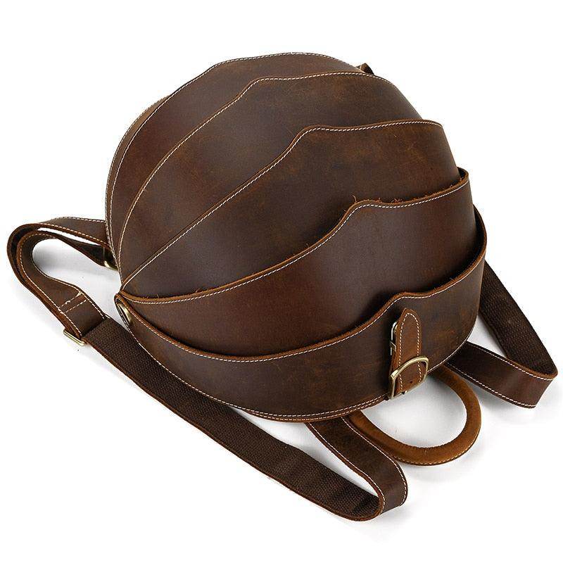 Accordion beetle daypack in brown leather with unique design and adjustable straps for comfort