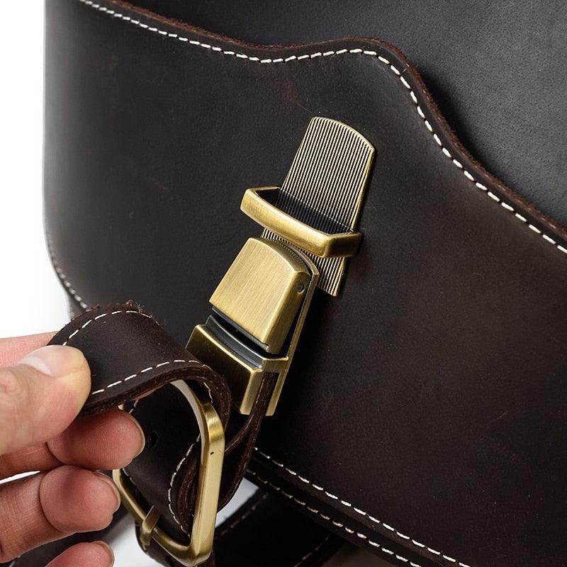 Close-up of the sturdy buckle and strap on VacationGrabs accordion beetle daypack for secure fastening