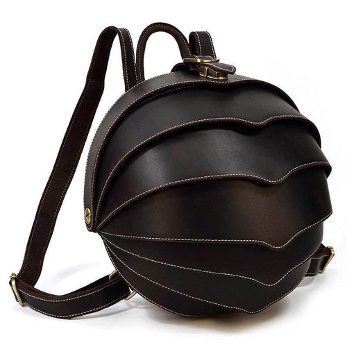 Accordion beetle daypack in dark brown leather with unique curved design and adjustable straps