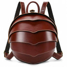 Accordion beetle daypack in brown leather with a unique layered design and adjustable straps