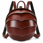 Accordion beetle daypack in brown leather with a unique layered design and adjustable straps