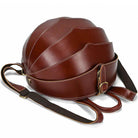 Accordion beetle daypack in rich brown leather with adjustable straps for stylish travel