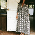 Women's black and white floral maxi dress, perfect for vacation wear