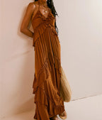 Women's rust-colored ruffle maxi dress, perfect for summer vacations