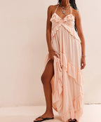 Women's peach ruffled maxi dress, perfect for summer vacations