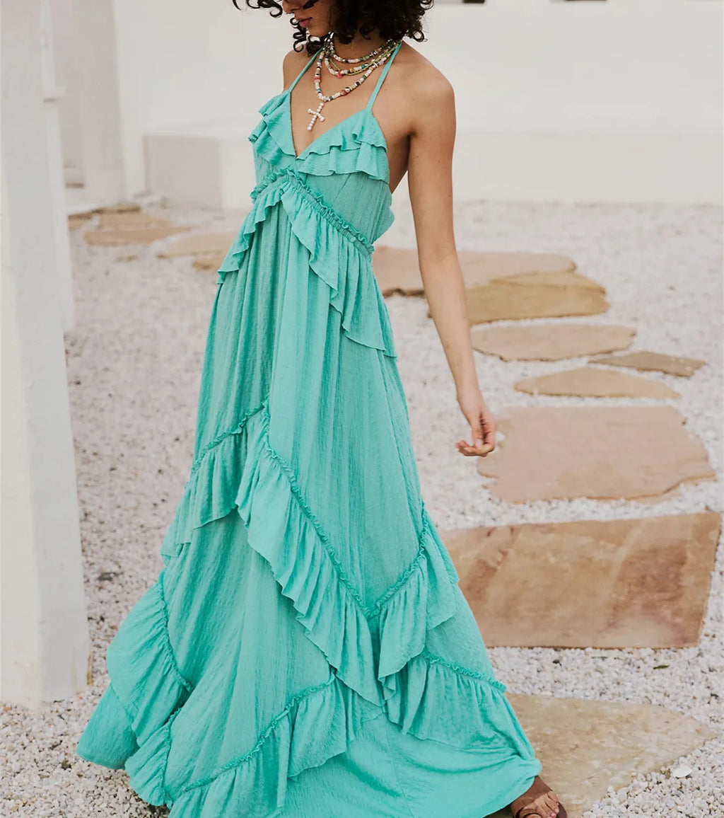 Women's teal ruffled maxi dress, perfect for summer vacations