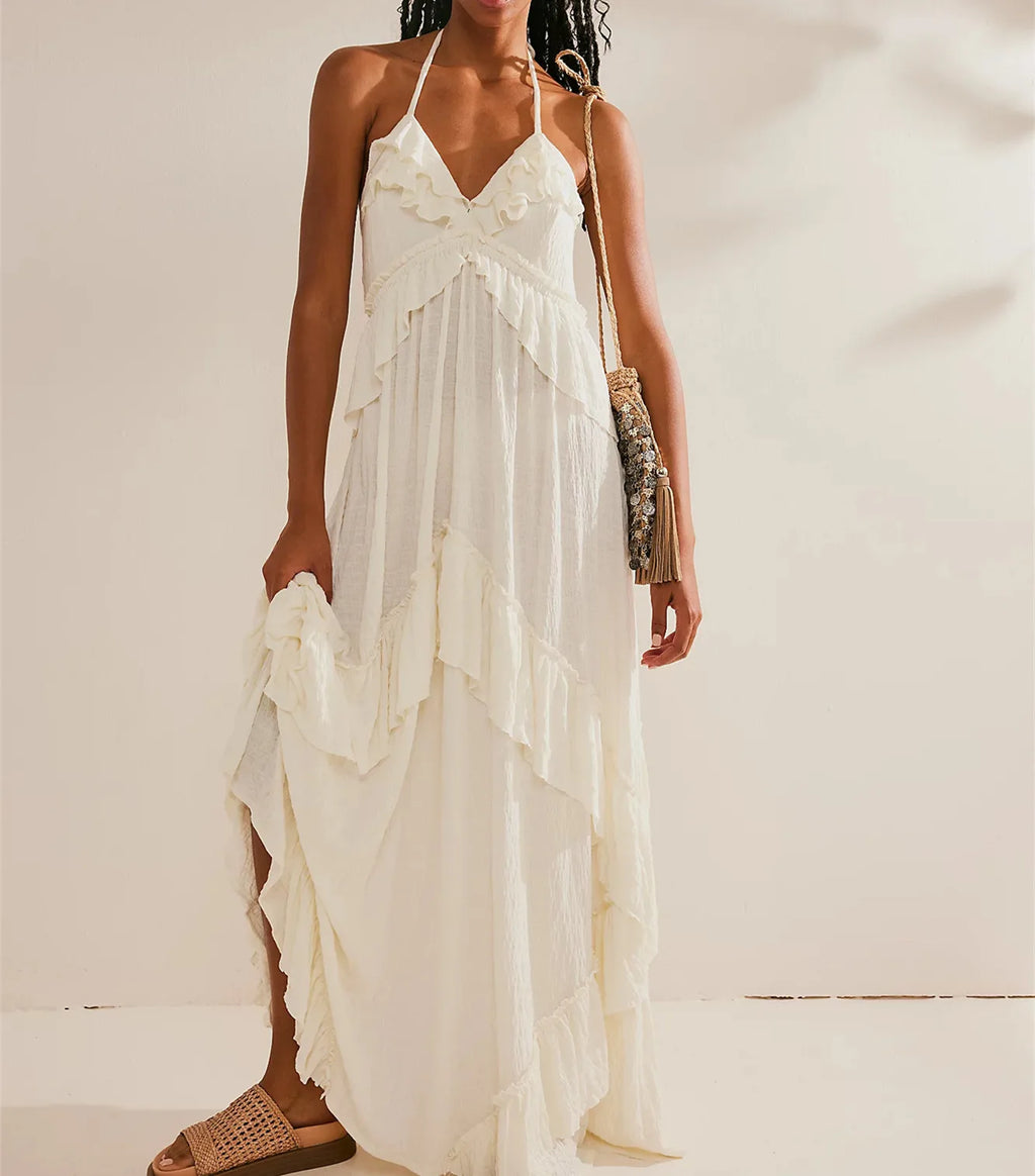 Women's white flowy maxi dress, perfect for summer vacations