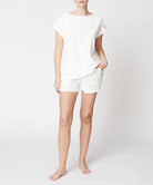 Fabina white bamboo linen shorts set featuring relaxed fit top and shorts with pockets for casual comfort