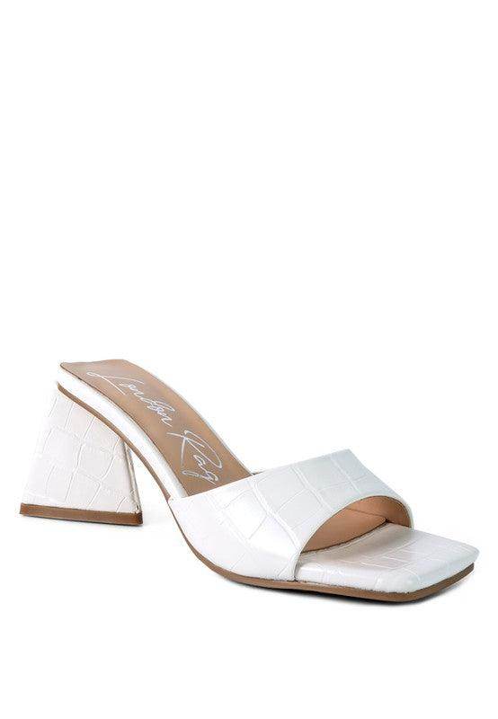 White block heel vacation sandals with a stylish design for chic summer outings