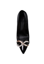 Women's black buckle embellished stiletto pumps, perfect for formal occasions