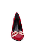 Women's red buckle embellished stiletto pumps for elegant occasions