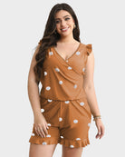 SheCurve built-in bra swim romper in brown with white polka dots and ruffle details, perfect for beach days