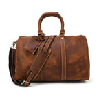 VacationGrabs Brown Leather Duffel Bag as stylish carryon luggage bags for travel with adjustable strap