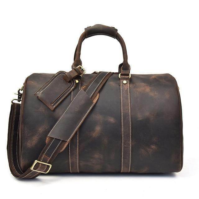VacationGrabs leather duffel bag designed as carryon luggage bags for travel with adjustable strap and sturdy handles