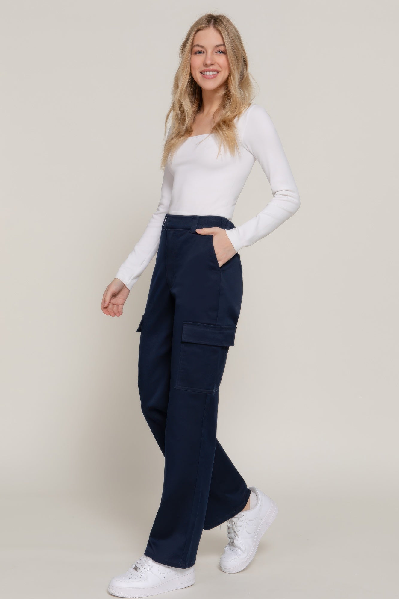 VacationGrabs women's navy casual straight leg trousers with cargo pockets paired with white long sleeve top
