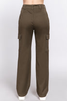 Back view of women's casual straight leg trousers in olive green with side pockets by VacationGrabs