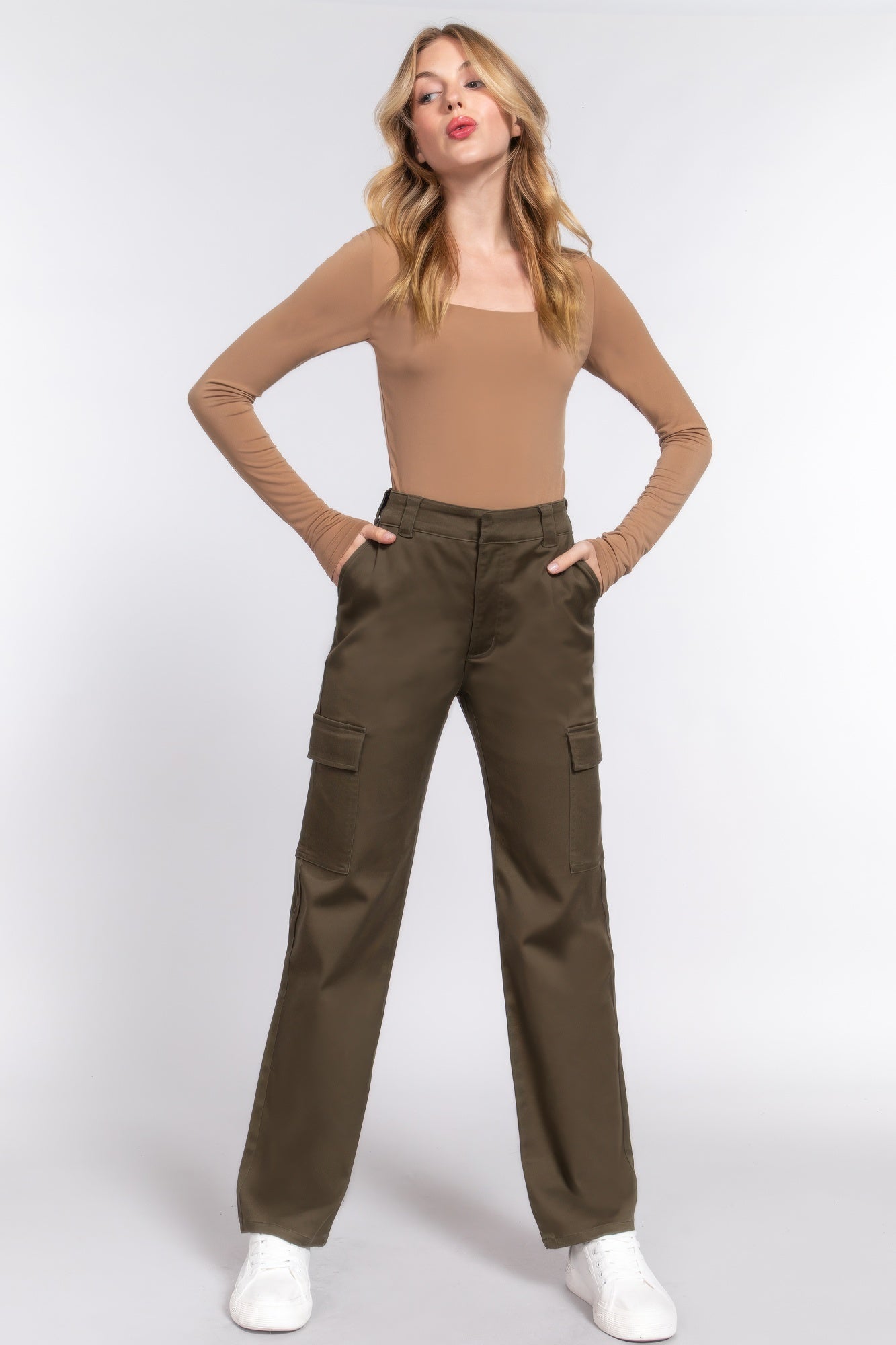 Women's casual straight leg trousers in dark olive green styled with a beige long sleeve top