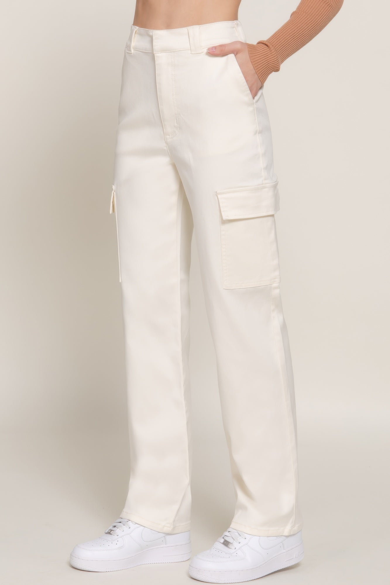 VacationGrabs women's casual straight leg trousers in white with side cargo pockets and white sneakers