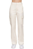 VacationGrabs women's casual straight leg trousers in beige with cargo pockets and white sneakers