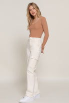 VacationGrabs women's casual straight leg trousers in white with side pockets styled with a tan long sleeve top
