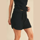 Aemi Co black casual tank and shorts set featuring textured fabric and drawstring shorts