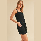 Aemi Co black casual tank and shorts set worn by a woman with a relaxed fit and drawstring shorts