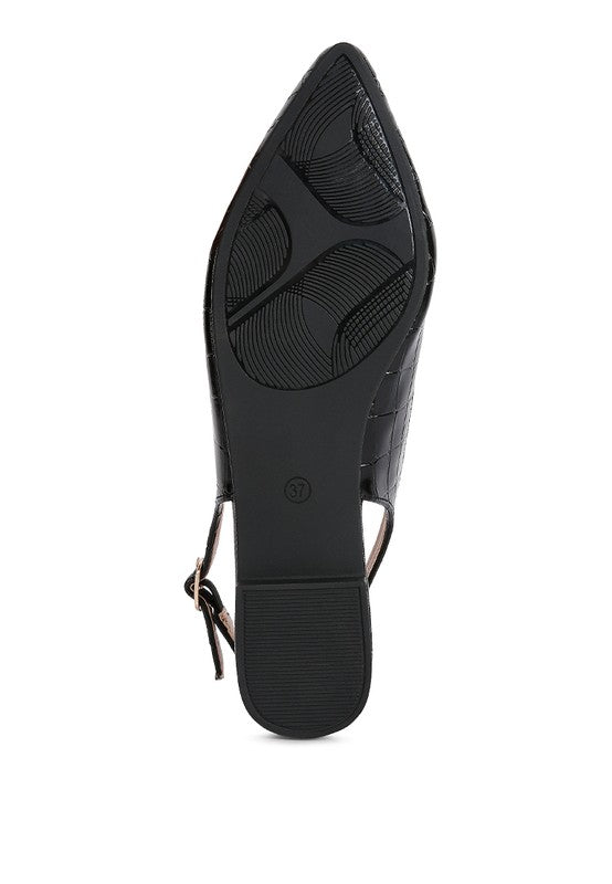 Sole view of Rag Company croc slingback flat sandals featuring a stylish textured design