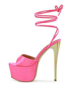 Dramatic lace-up high heels in pink satin with a gold stiletto heel and stylish ankle straps