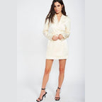 Emory Park drawstring mini dress in cream color with long sleeves and a stylish wrap design