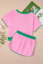 YNIQUE pink and green drop shoulder casual summer set with elastic waist shorts and contrast trim