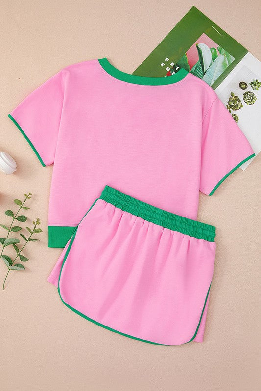 YNIQUE pink and green drop shoulder casual summer set with elastic waist shorts and contrast trim