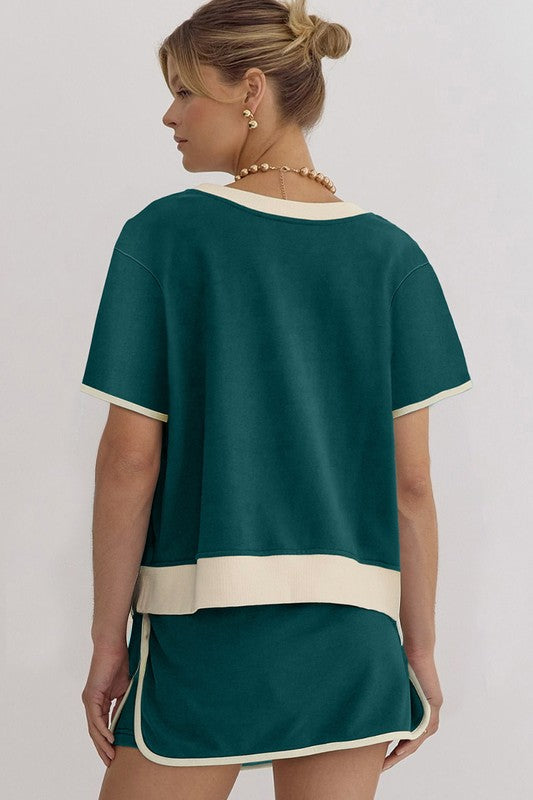 YNIQUE drop shoulder casual summer set with teal top and skirt featuring cream trim details